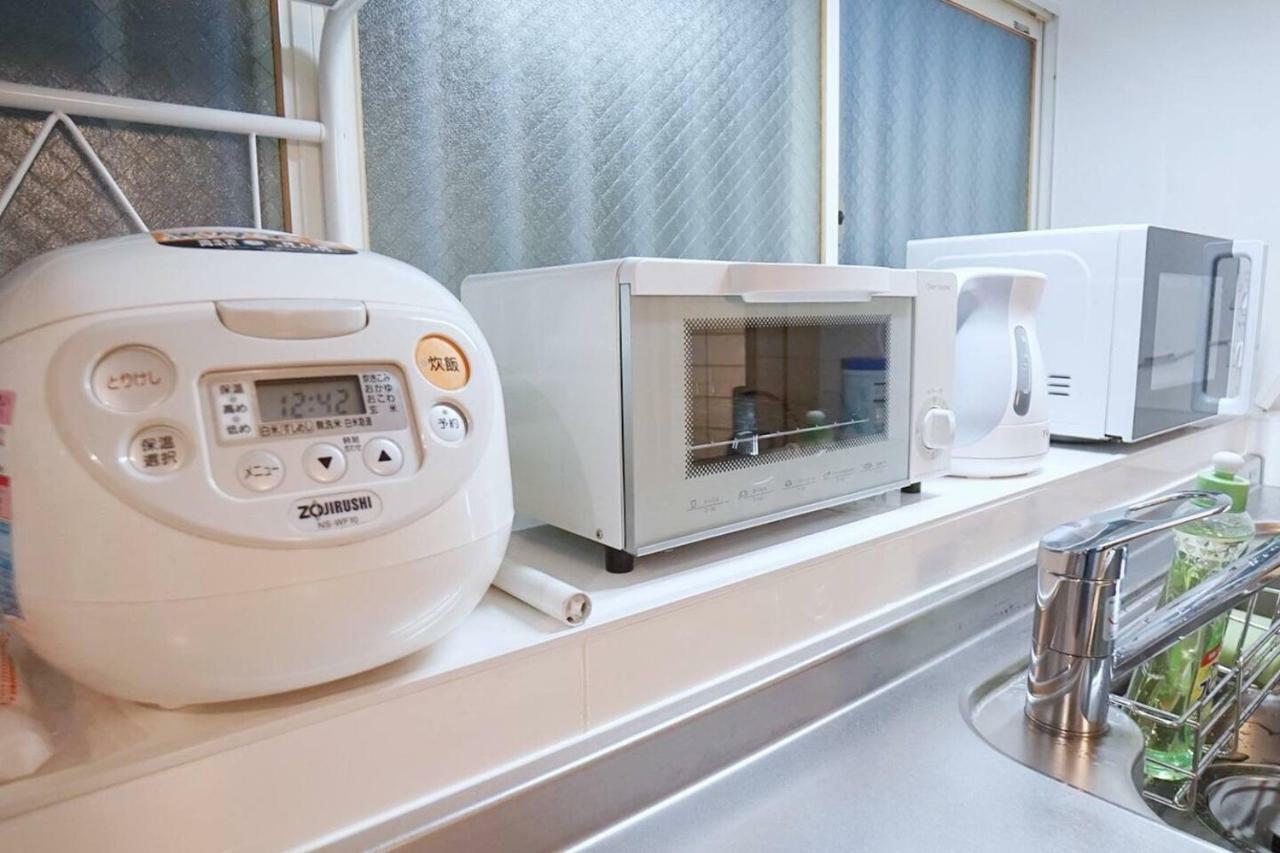 Hotel 雲波館 à Nagoya Extérieur photo